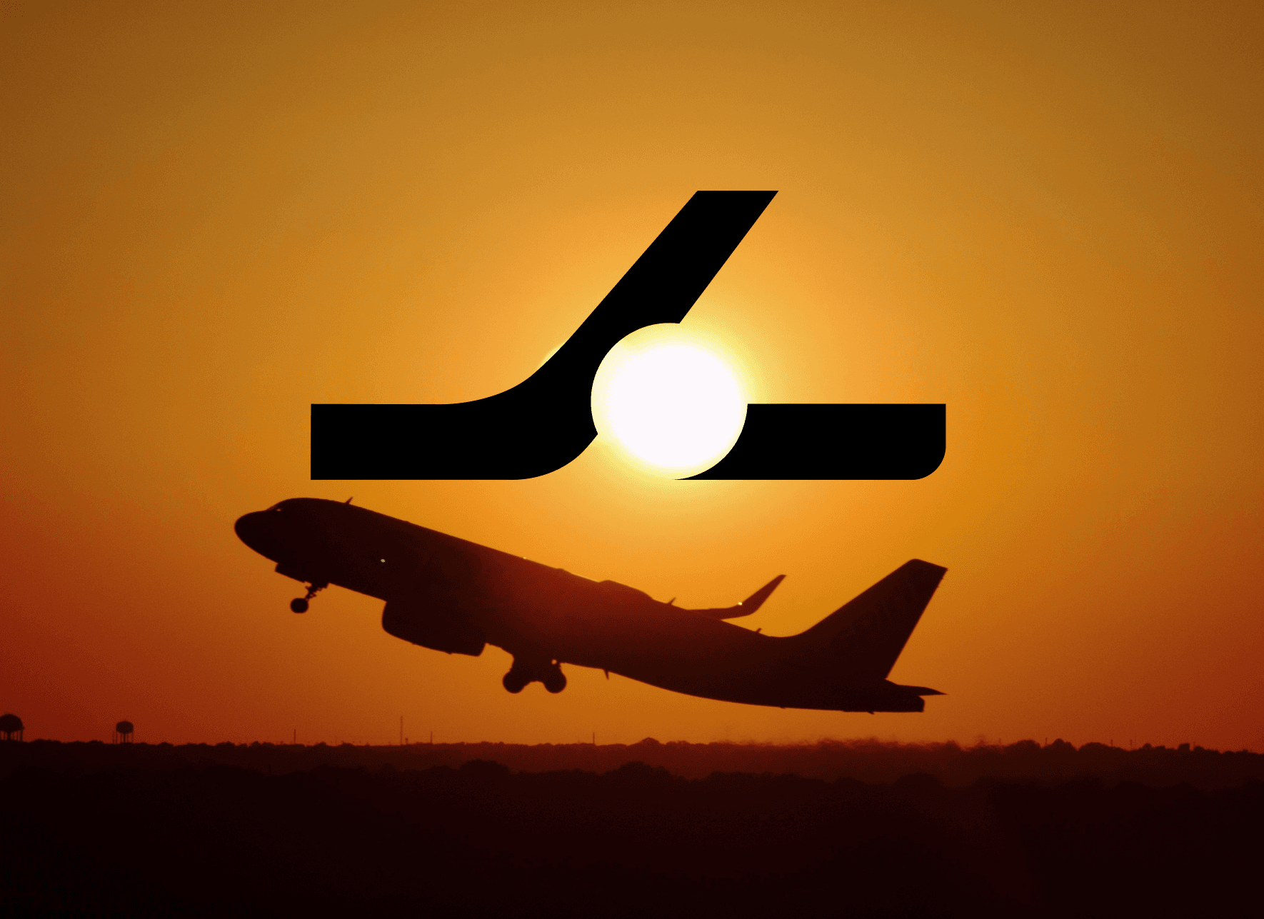 BVJ symbol over an airplane taking off at sunset