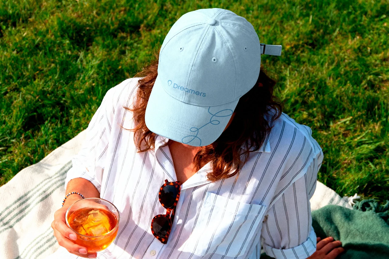 Dreamers cap worn outdoors